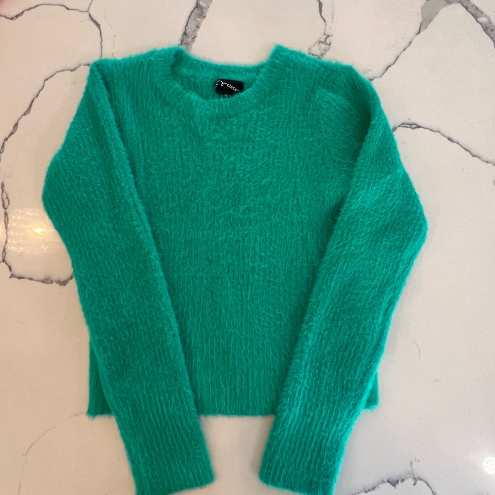 green sweater.